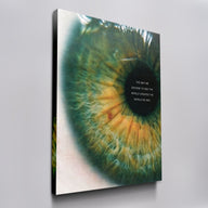 A Matter of Perspective green and gold eye wall art on canvas, angled view