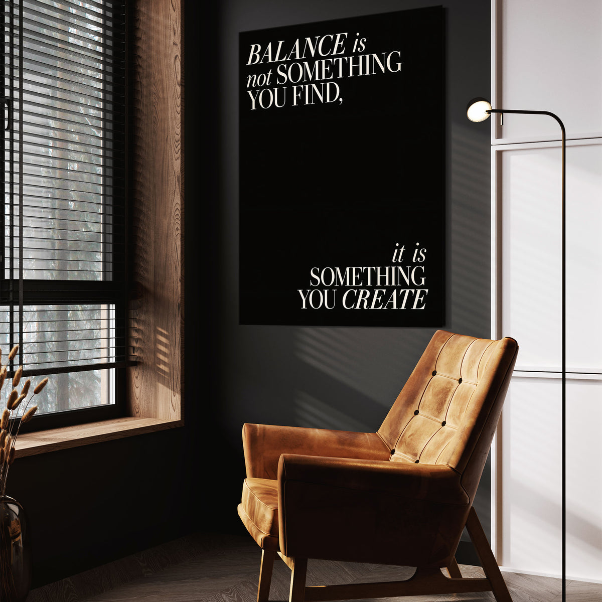 Balance quote wall art above a tan chair in a dark reading corner