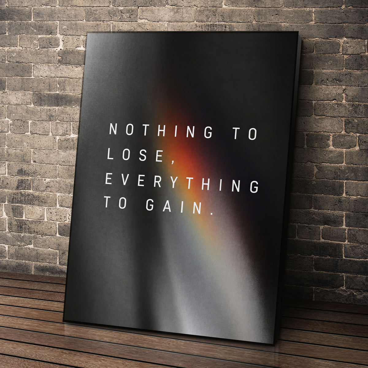 Everything To Gain motivational wall art leaning against a brick wall