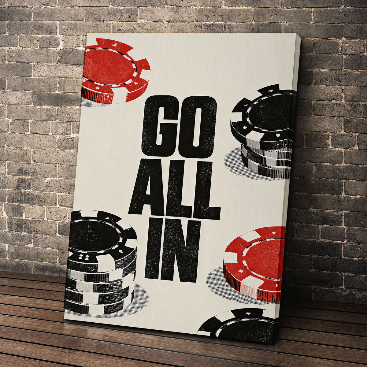 Go All In wall art leaning against a brick wall
