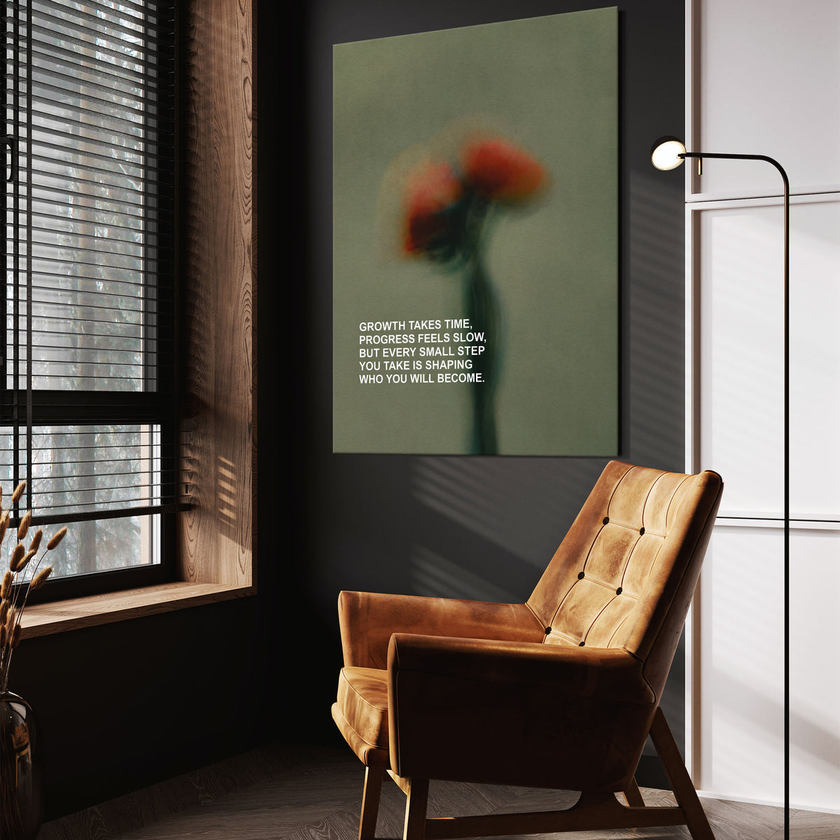 Growth Takes Time wall art above a wooden lounge chair in a dark room