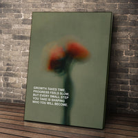Growth Takes Time wall art leaning against a brick wall