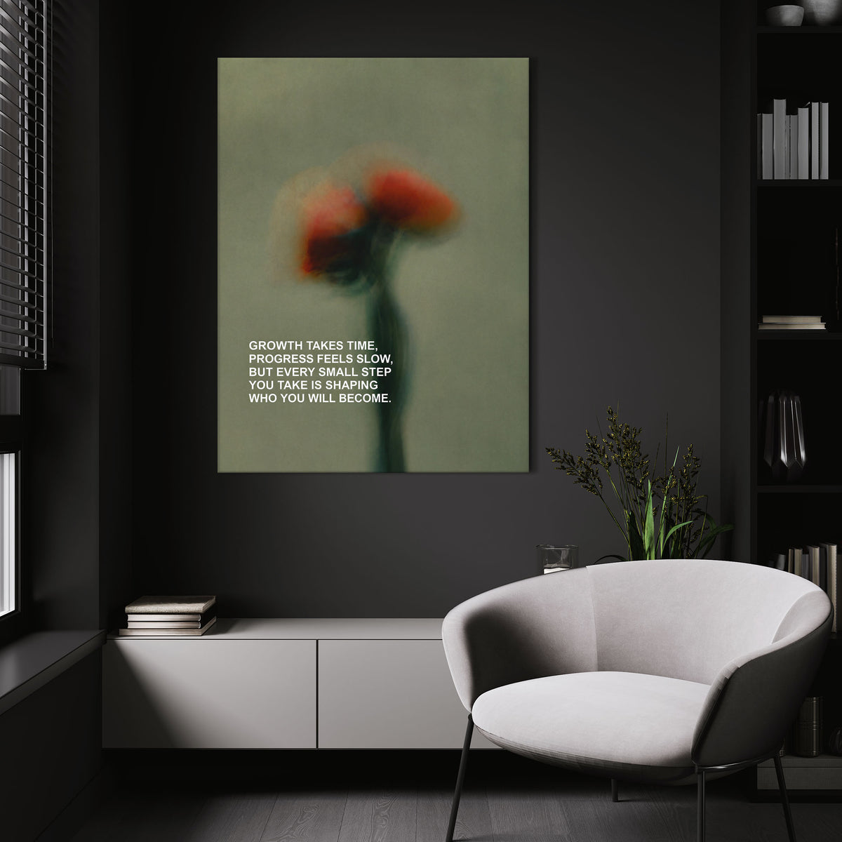 Growth Takes Time wall art above a white chair in a dark room