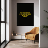 Habits Over Goals wall art above a tan chair in a bright room