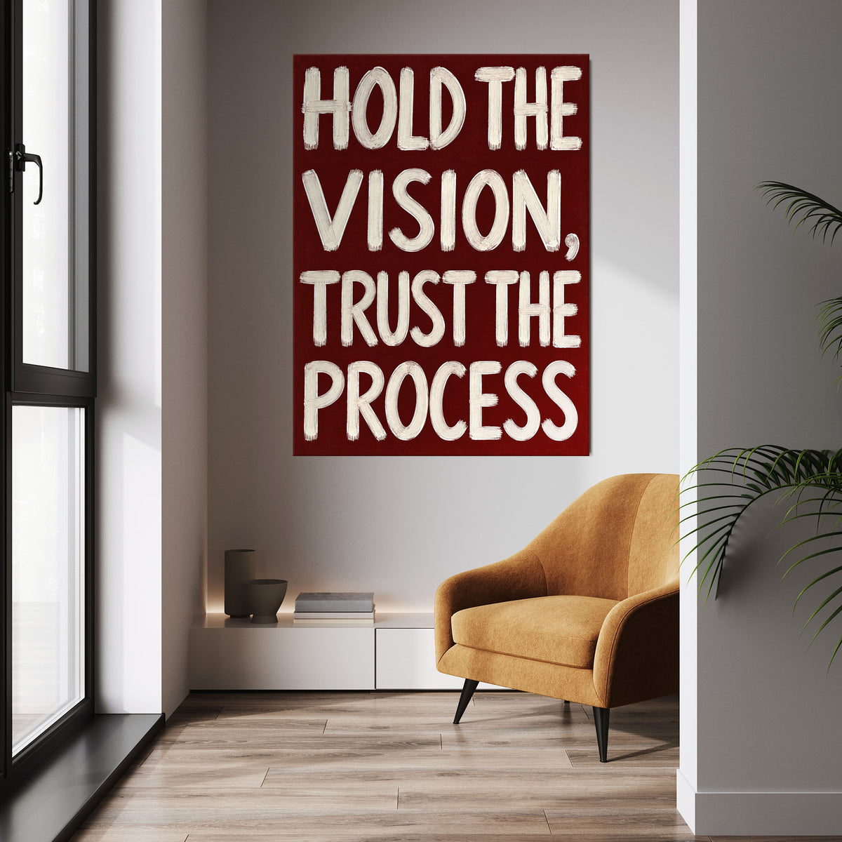 Hold the Vision wall art above a tan chair in a bright room