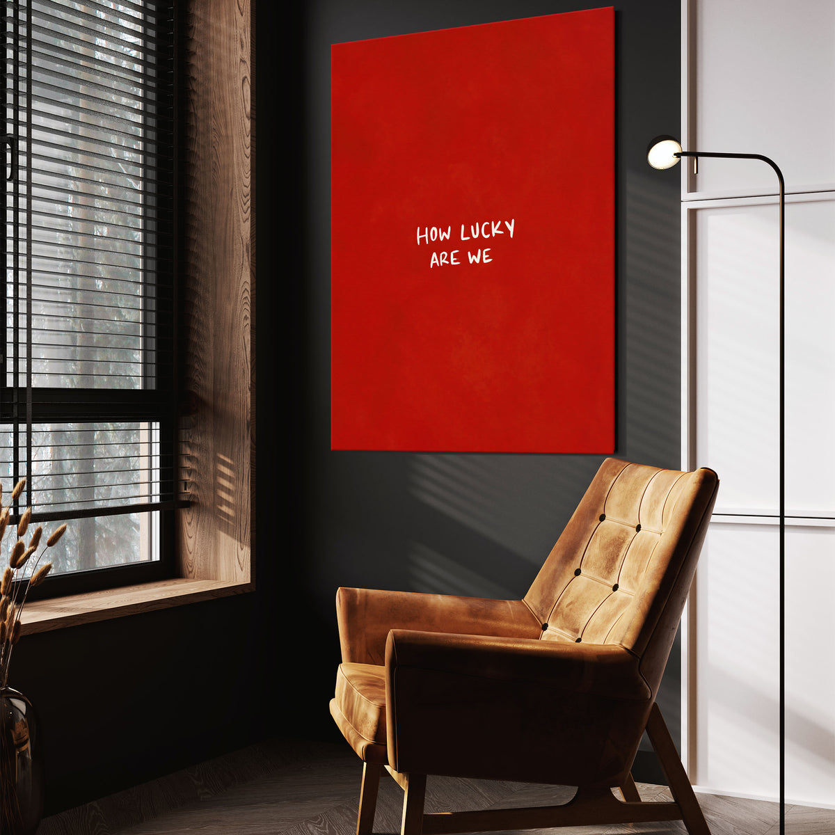 How Lucky Are We wall art above a wooden lounge chair in a dark room