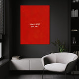 How Lucky Are We wall art above a white chair in a dark room