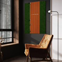 Let The Work Talk wall art above a tan chair in a dark reading corner