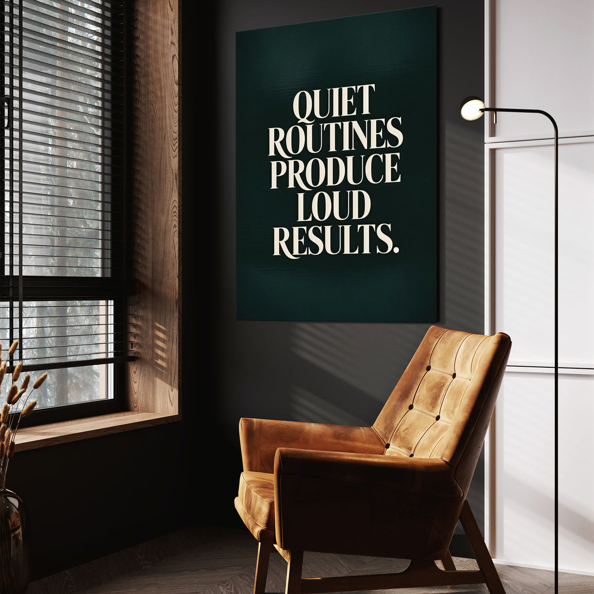 Loud Results wall art above a tan chair in a dark reading corner