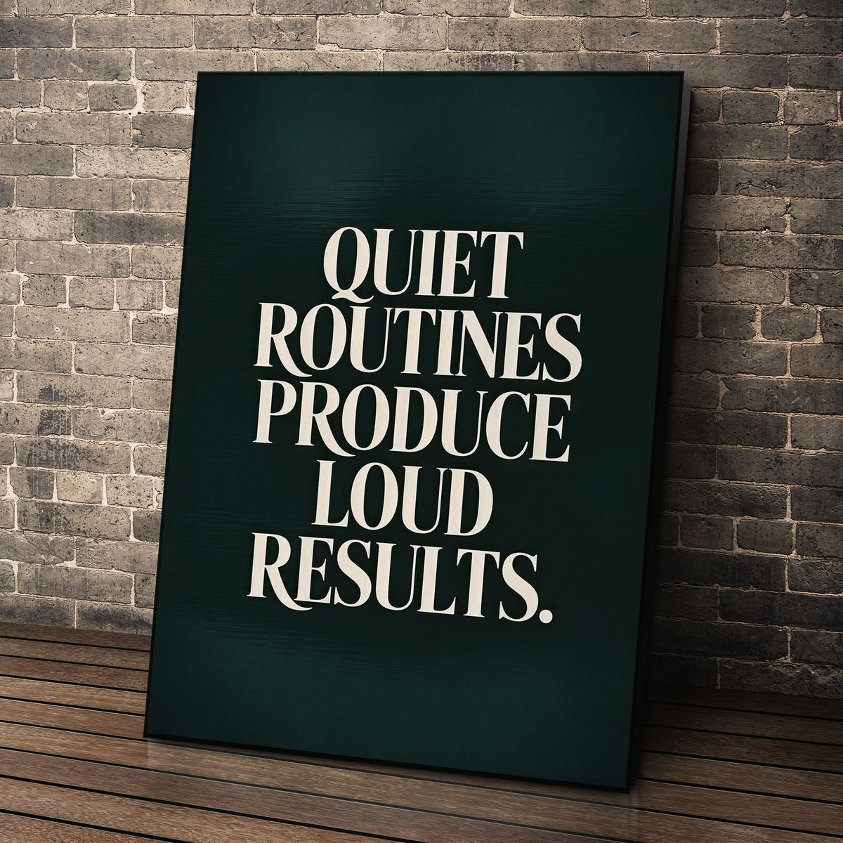 Loud Results wall art leaning against a brick wall