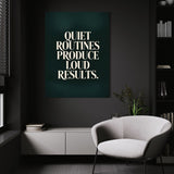 Loud Results wall art above a white chair in a dark room
