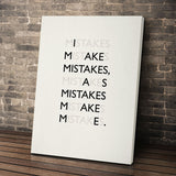 Mistakes wall art leaning against a brick wall