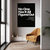 No One Has It All Figured Out wall art above a mustard chair in a bright room
