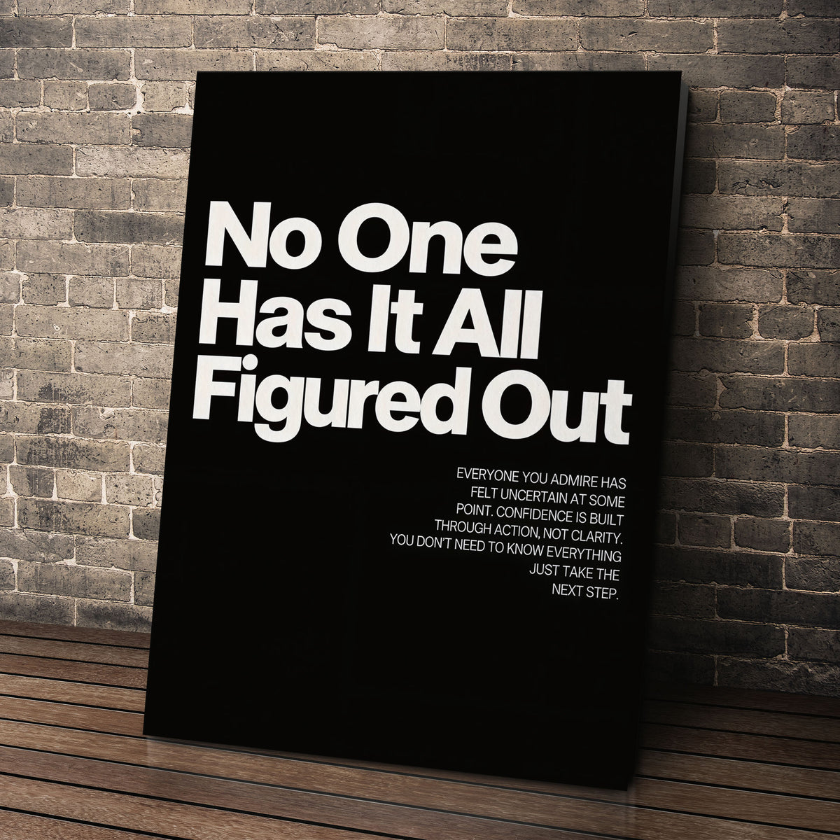 No One Has It All Figured Out wall art leaning against a brick wall