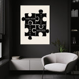 Puzzle Pieces wall art above a white chair in a dark room