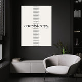 Show Up Daily wall art above a white chair in a dark room