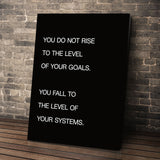 Systems > Goals wall art leaning against a brick wall