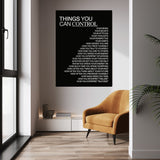Things You Can Control (Black) wall art above a tan chair in a bright room