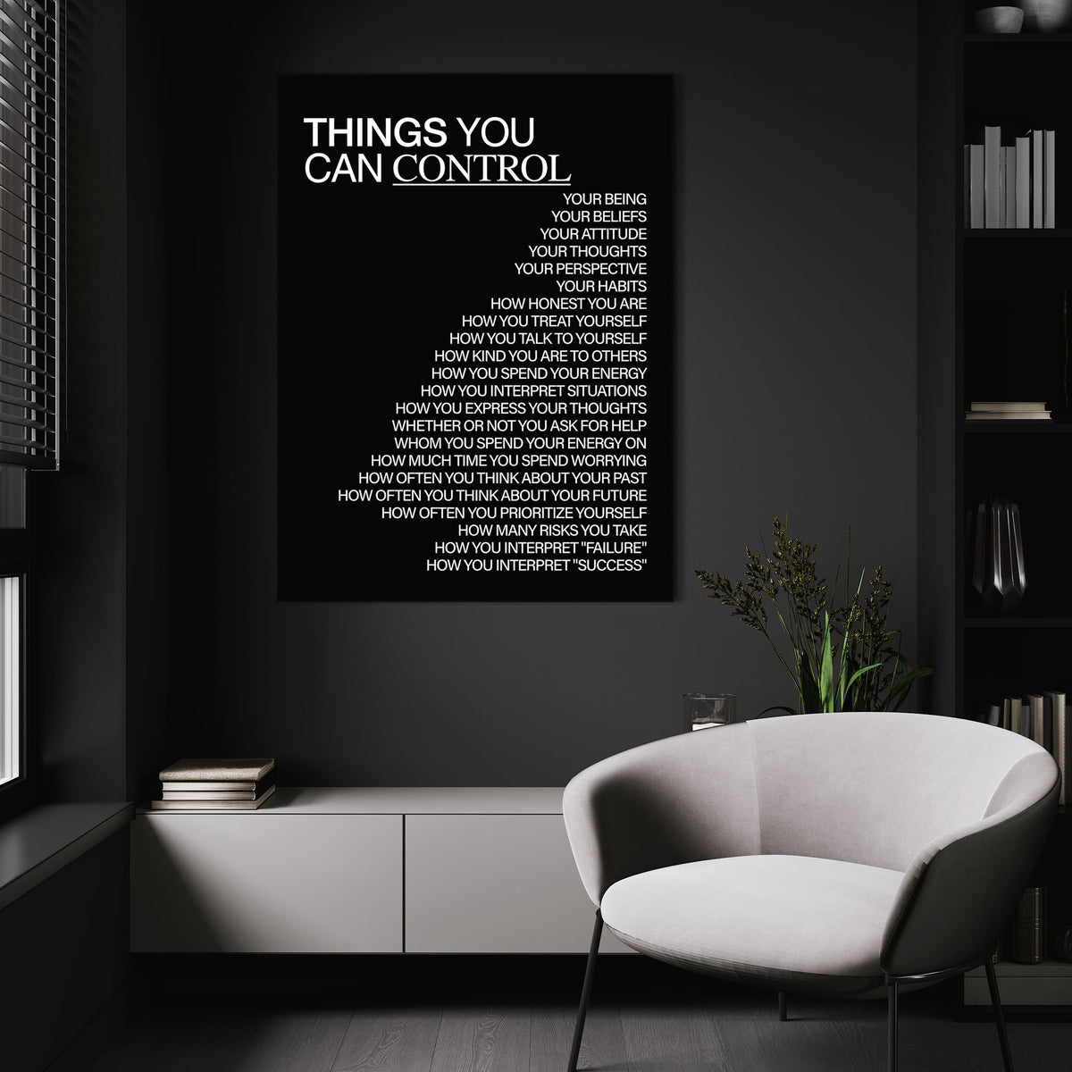 Things You Can Control (Black) wall art above a white chair in a dark room