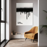 Until It Works wall art above a mustard chair in a bright modern room